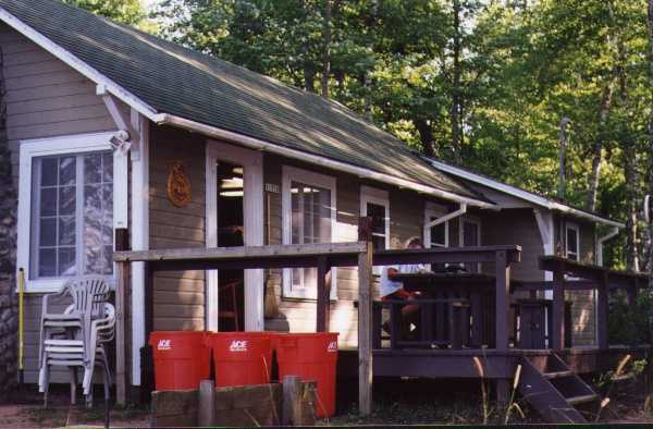 photo exterior side view of cabin with porch