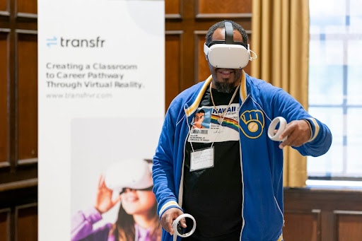 Goodman South Madison Teen Services Librarian Will R. Glenn Sr. Trying Career Exploration Virtual Reality (Photo credit: Andy Manis)