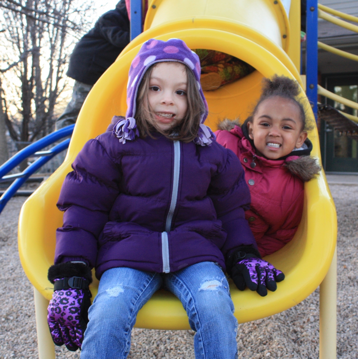 two children on slide