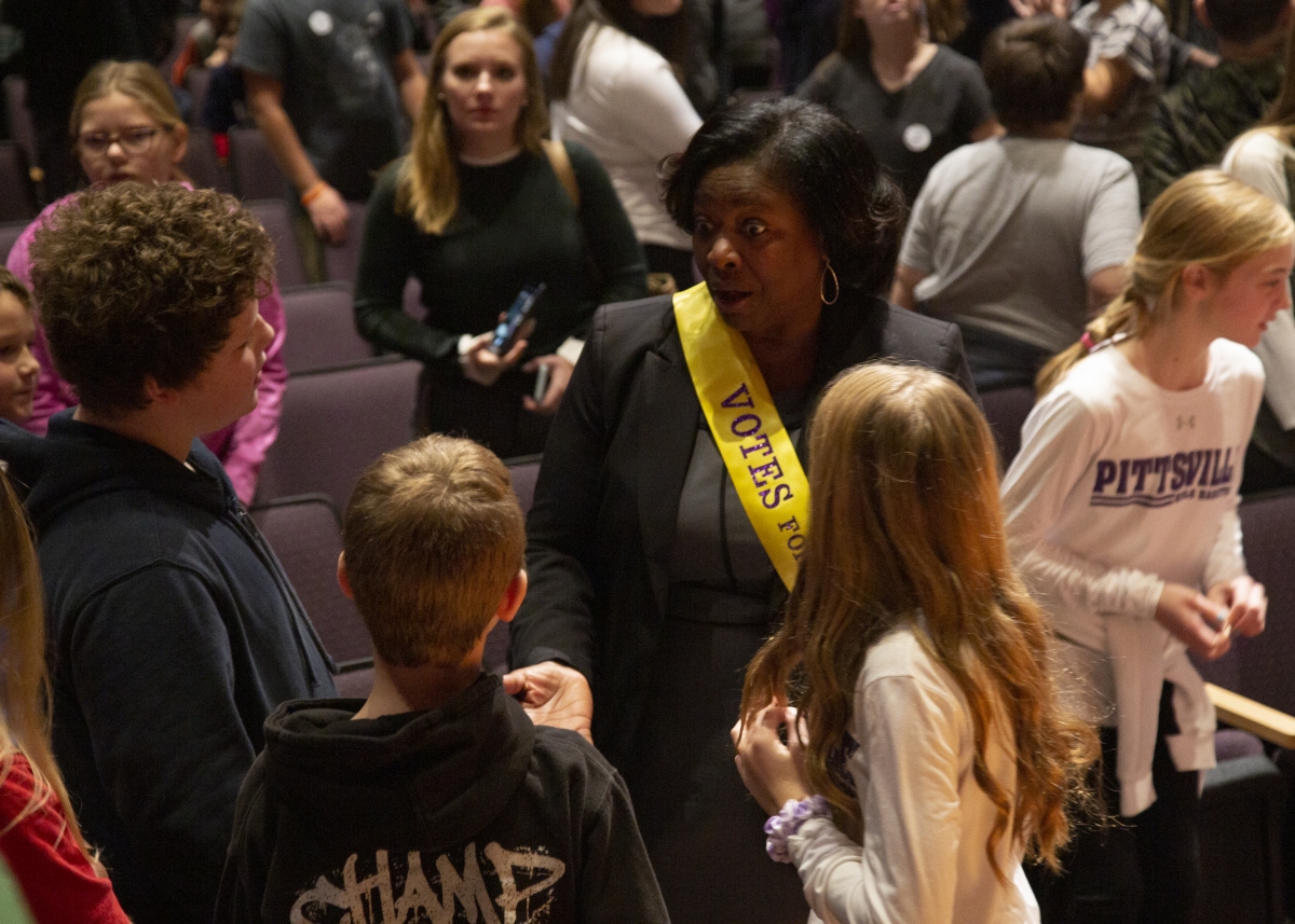 State Superintendent talking with students