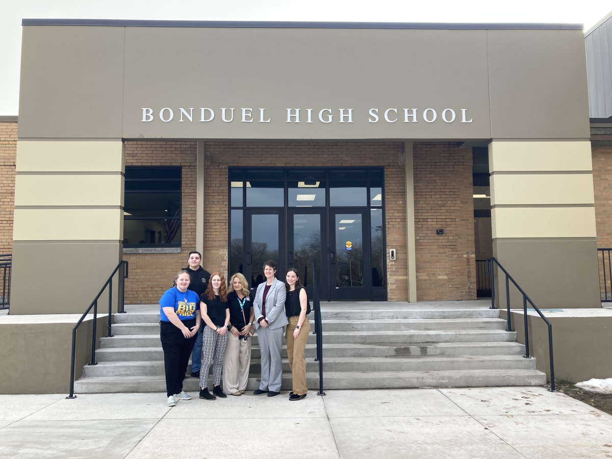 A closing photo with Dr. Underly's student hosts at Bonduel High School. 