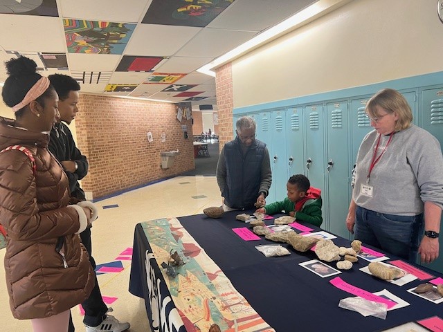 Parents and students engage at the STEAM fair