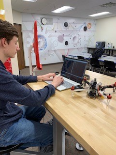 Student, John Schiltz is trained to use the Phab Lab