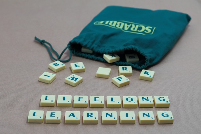Scrabble letters spell "LIFELONG LEARNING"