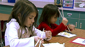 kids using chopsticks